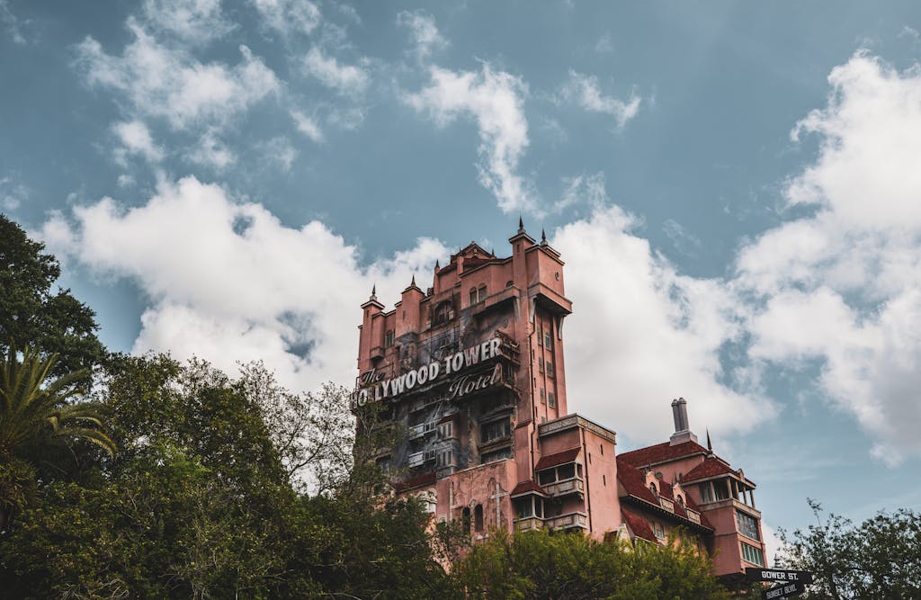The iconic Hollywood Tower Hotel under a clear sky at Disney's Hollywood Studios in Florida.
